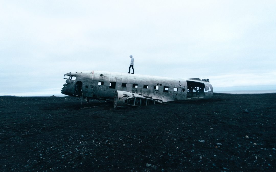 person standing on wreckage